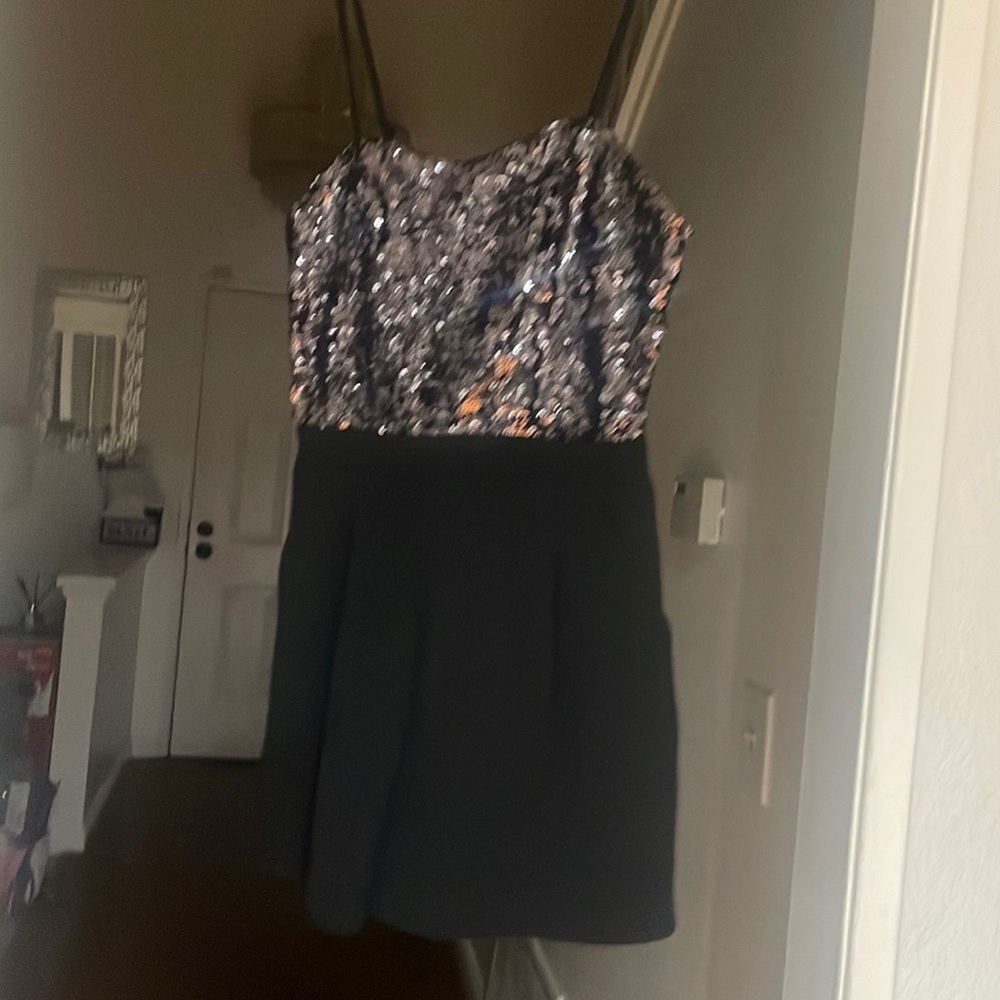 Black Sequin short romper.